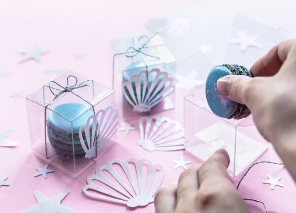 Ронливи пастели Makaronki в прозрачна опаковка за подарък, подходящи за тематични партита и празници, с морски мотиви, като ракушки и звезди. Перфектни за декориране и забавление.