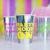 Метален чаш за парти със сияен ефект и цветен надпис "PARTY MOOD ON" за весел парти атмосфера.