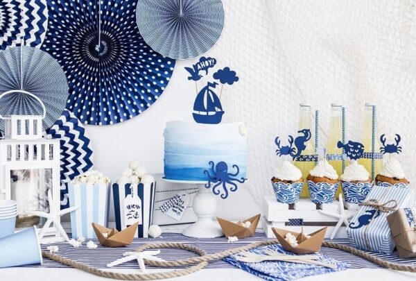 Висококачествена украса за морска тематична парти, включваща торта, сладкиши и декорации с морски мотиви, перфектна за рожден ден или морски празник.
