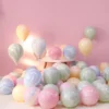 Colorful pastel balloons in pink, blue, green, and yellow, ideal for celebration decorations. Perfect for birthdays, parties, and festive events with vibrant and cheerful ambiance.