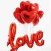 Lyuminozni baloni za Денот на вљубените, црвени срца со посебно слово love, идеални за романтични прослави и подаръци.