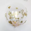 Красив балон с послание "I Love You" във златист цвят и сърца, идеален за романтични събития и изненади.