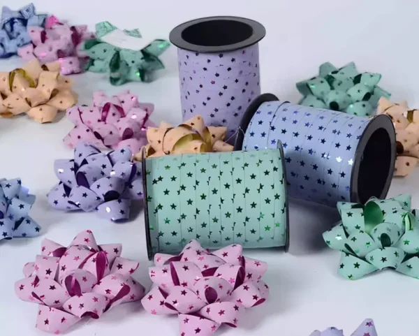 P scented curling ribbon spools in pastel colors with star patterns for decorations, gift wrapping, and celebration parties, high-quality party accessories, festive and colorful curly bows.