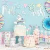 Make a wish, party balloons, unicorn cake, pastel decorations, birthday celebration, children's party supplies, cake with rainbow top, cupcake display, party decor set, festive dessert table.