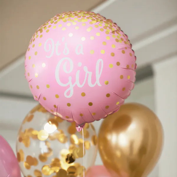 Розов балон с надпис "It's a Girl" за бебешка празнична украса, сватба или рожден ден, с златни точки и празнична атмосфера.
