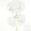 Бели балони с хартиени панделки за празнични събития и тържества, подходящи за декорация на рожден ден, сватба или специален повод.