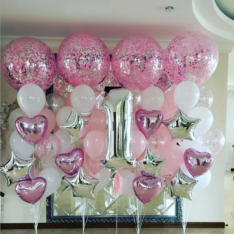 Розови балони с конфети, фолиеви сърца и звезди и сребърна цифра едно